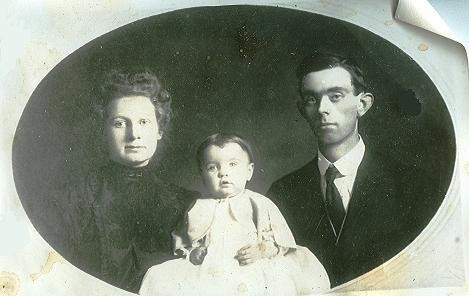 Old family photographs arranged on a table
