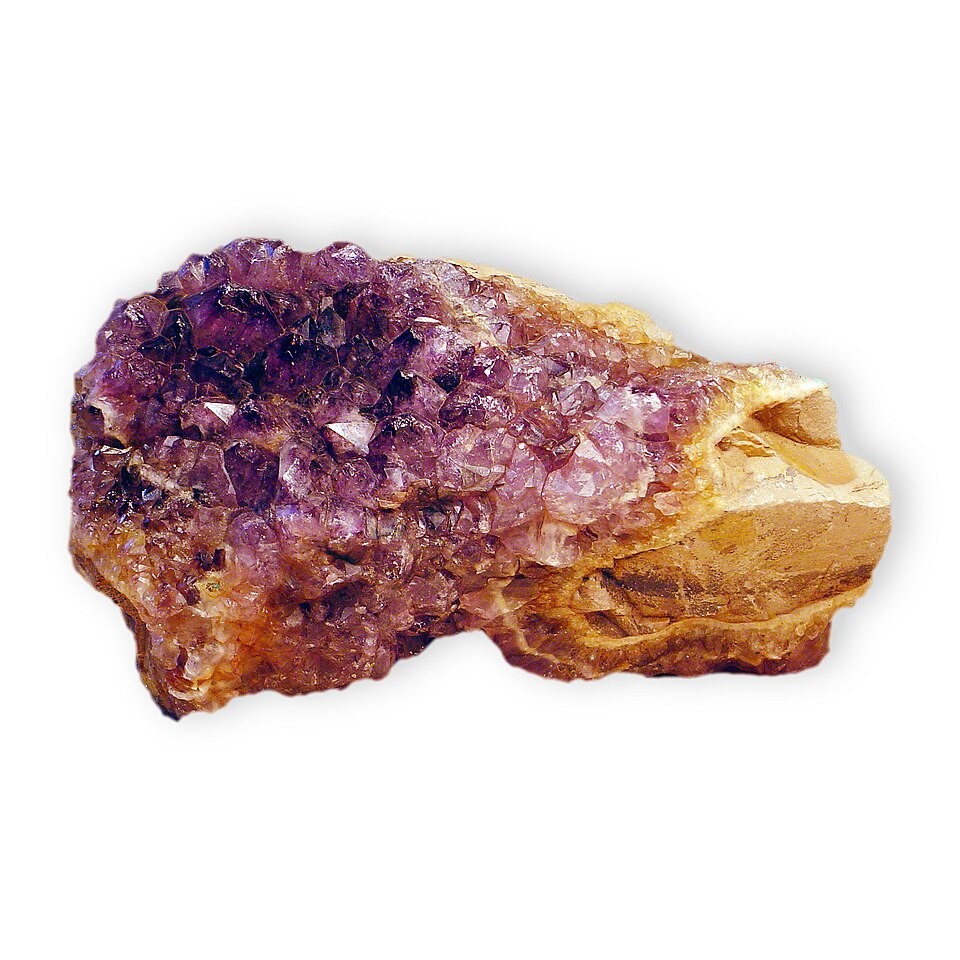 Purple amethyst crystals on a pale mineral base